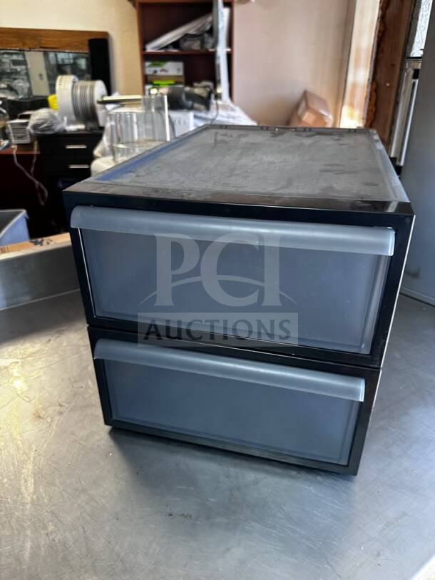 "The Container Store storage containers, excellent condition, black frame with two translucent drawers, ready for use."