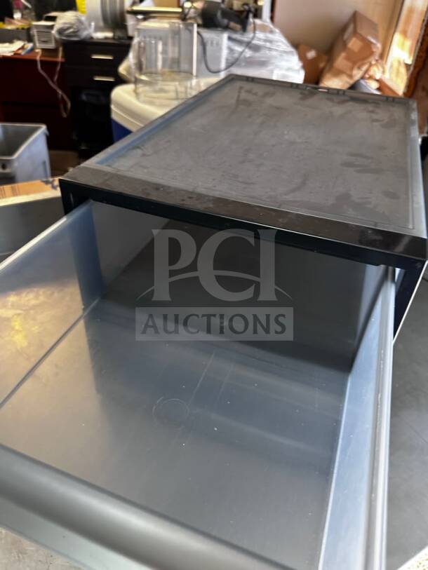 The Container Store storage container, excellent condition, clear drawer, sleek black frame, quantity 2, ready for use.