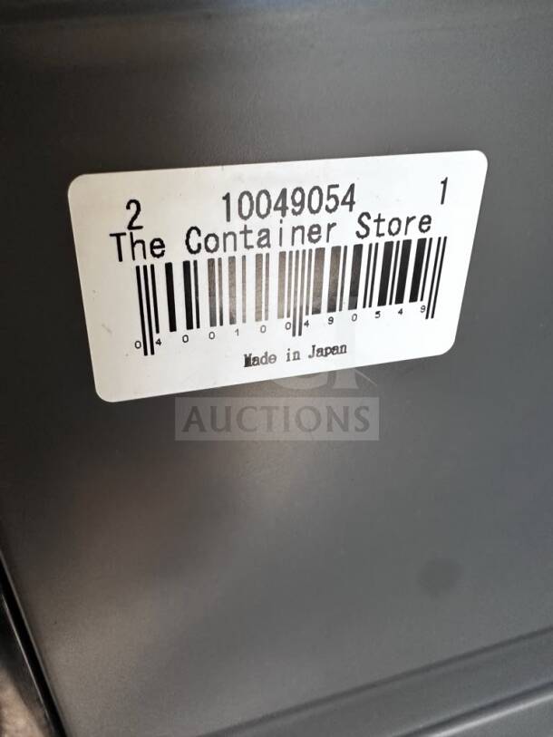 The Container Store storage container with label. Barcode 10049054, made in Japan. Excellent condition, perfect for organization.