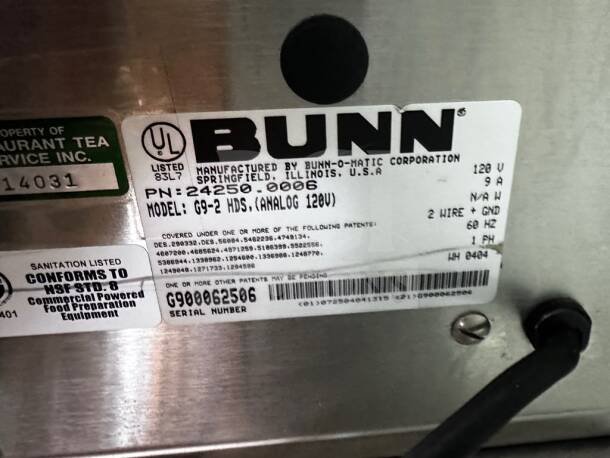 Label on BUNN G9-2T DBC Tall Batch Coffee Grinder with manufacturing details, NSF compliance, and serial number G900062506.
