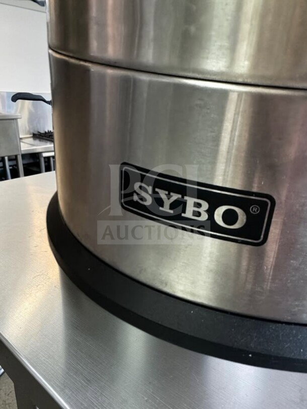 SYBO stainless steel 100-cup coffee percolator urn, model SR-CP-100B, pristine condition, visible SYBO logo.