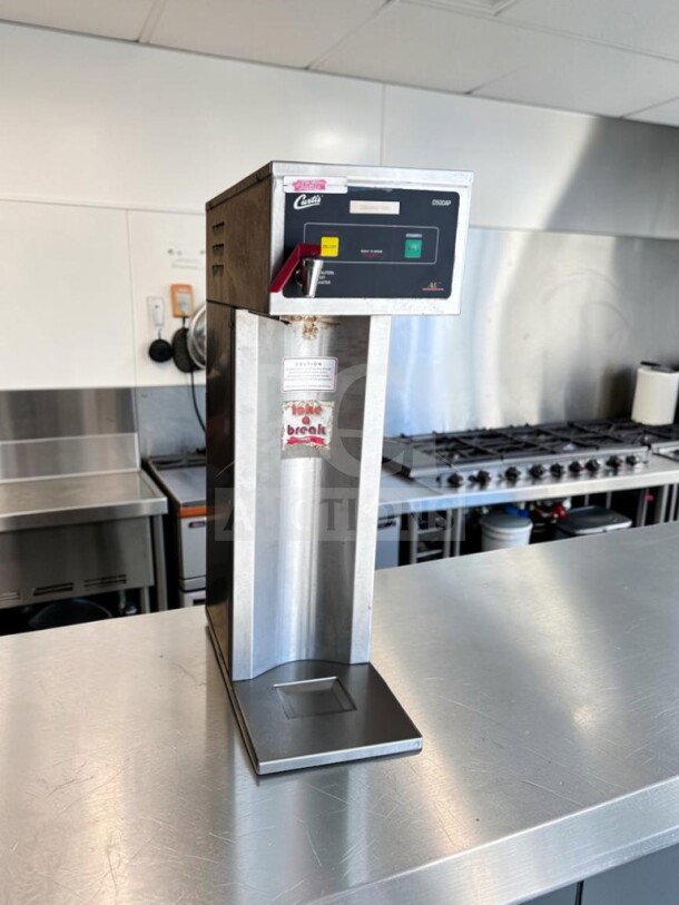 Wilbur Curtis D500-APT-12 commercial airpot coffee brewer in stainless steel, operational, 120V, made in USA.