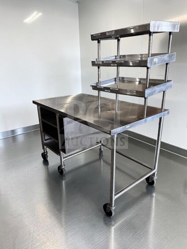Pristine stainless steel work table, 60"x34", with over shelf, under table racks, and casters, model GEN-S-TBL-1189.
