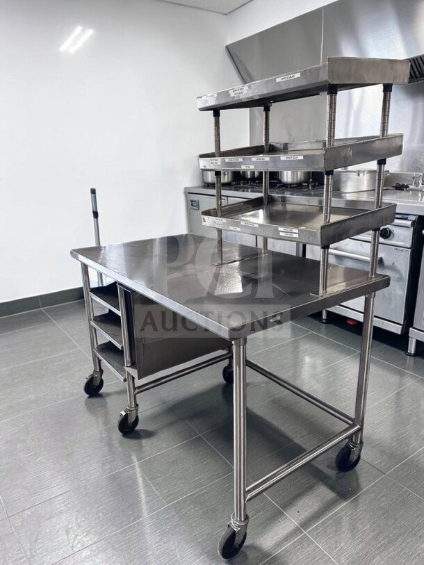 Pristine stainless steel work table, 60"x34", with over shelf, under table racks, casters; Custom Stainless Steel model GEN-S-TBL-1189.