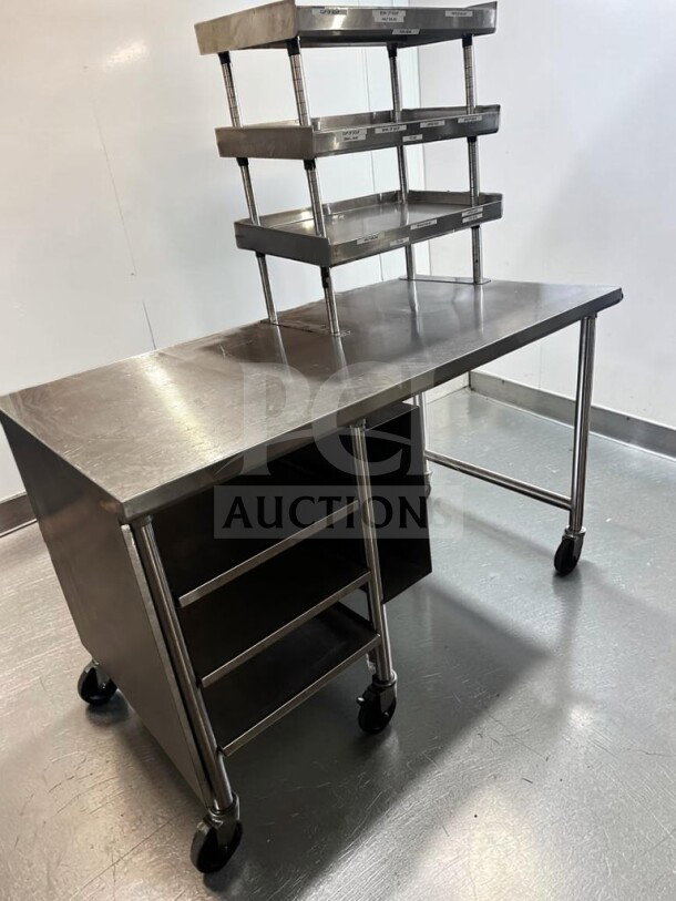 Pristine commercial stainless steel work table, 60"x34", with over shelf, under table racks, and casters, model GEN-S-TBL-1189.