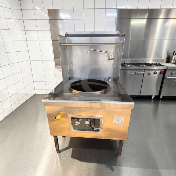Prime condition ABC Restaurant Equipment ABC-1 natural gas Chinese wok range. 1-hole stainless steel, 100,000–110,000 BTU, fully tested.
