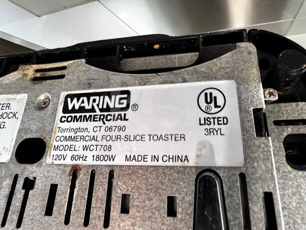 Waring WCT708 four-slice pop-up toaster, 120V, NSF & UL Listed, label showing model and power specs, outstanding condition.