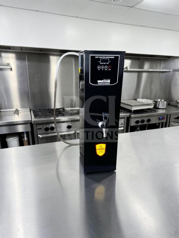 WantJoin WZK5SX015BKU hot water dispenser, 15L, black, 110-120V, 1800W, in exceptional condition, caution label visible.