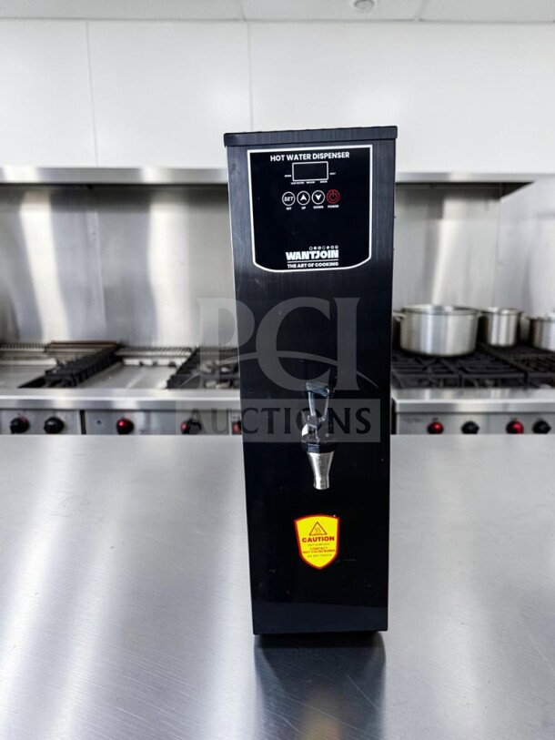 WantJoin WZK5SX015BKU 15L hot water dispenser, black, 110-120V, 1800W, exceptional condition, caution label visible.