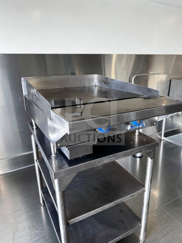 Imperial ITG-24 commercial gas griddle, 24" with 1" steel plate and thermostatic controls, natural gas, excellent condition.