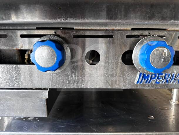 Imperial ITG-24 gas griddle with blue thermostatic controls, stainless steel, logo visible, fully tested, top-tier condition.