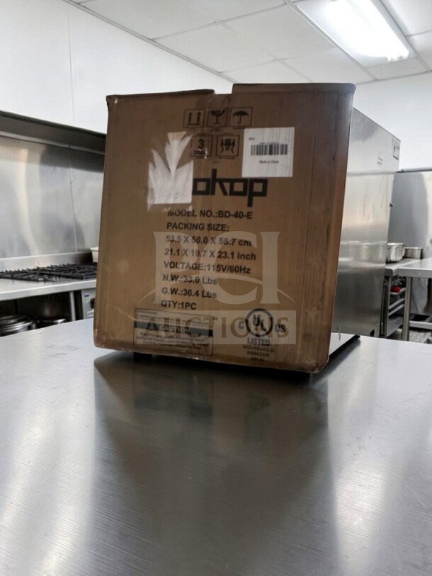 New ZOKOP BD-40-E Compact Upright Freezer, 31.1L, 115V, cULus Listed, open box, in kitchen setting. Box marked with model details.