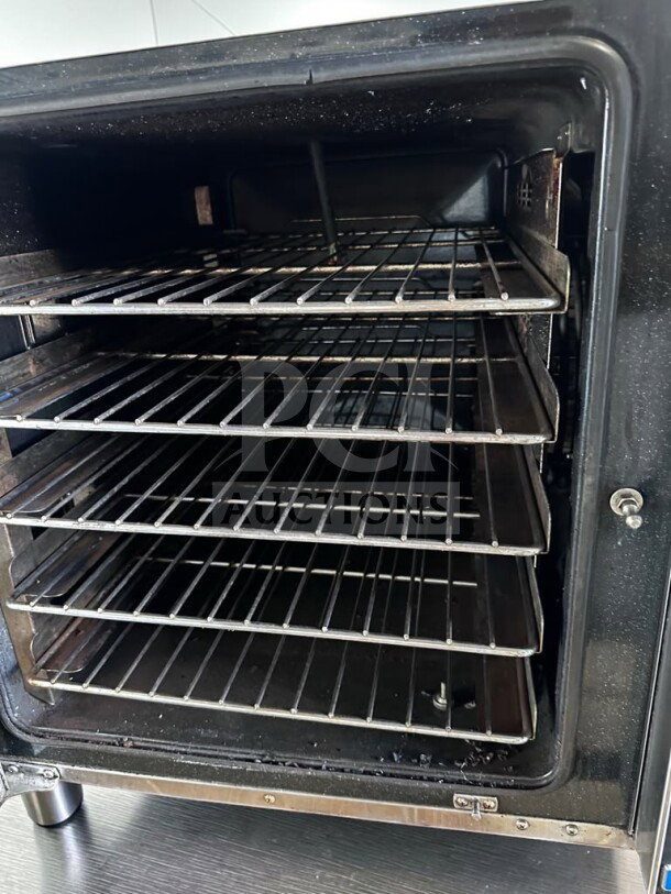 Moffat E32D5 Turbofan convection oven, single deck, electric, with multiple racks, in prime condition, NSF & ETL listed.