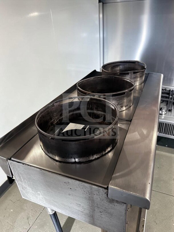 High-grade Star Max ORHP-336, 36" stainless steel wok range, 3 burners, natural gas, 90,000 BTU, tested and operational.