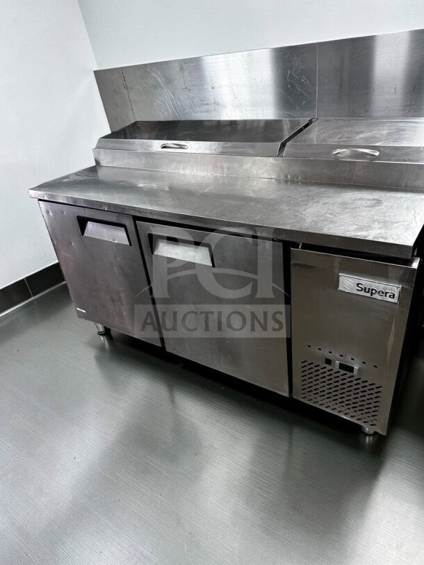 Supera PPT2R-1 67" refrigerated pizza prep table, optimal condition, 20 Cu. Ft., stainless steel, tested, fully operational.