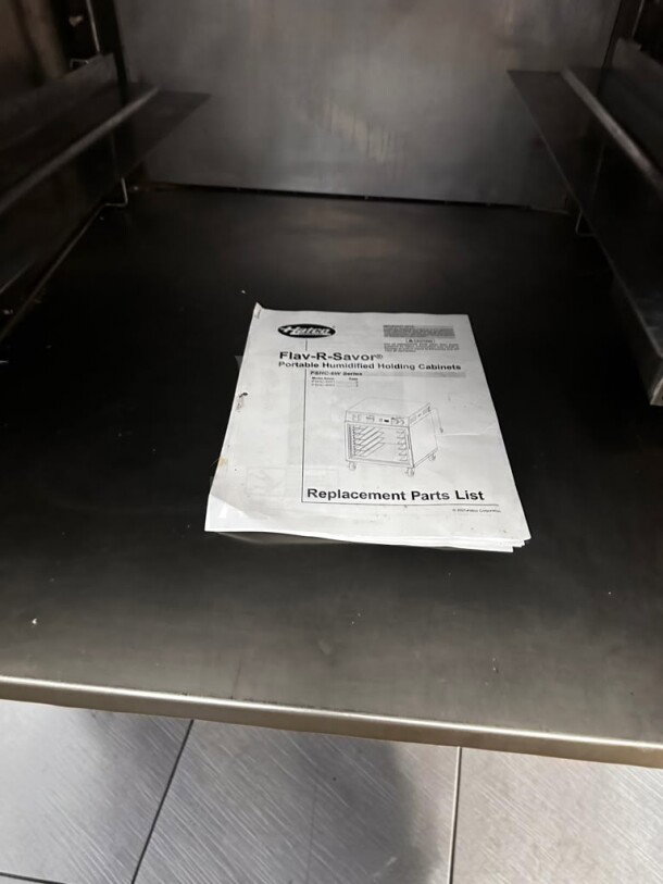 Hatco FSHC-6W1 Flav-R-Savor heated cabinet, 6 pan capacity, shown with manual inside. NSF & UL listed, fully operational.