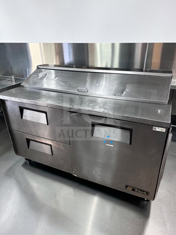 Alt text: True TSSU-60-16D-2 refrigerated prep table, 60", right door, two drawers, excellent condition, NSF UL listed.