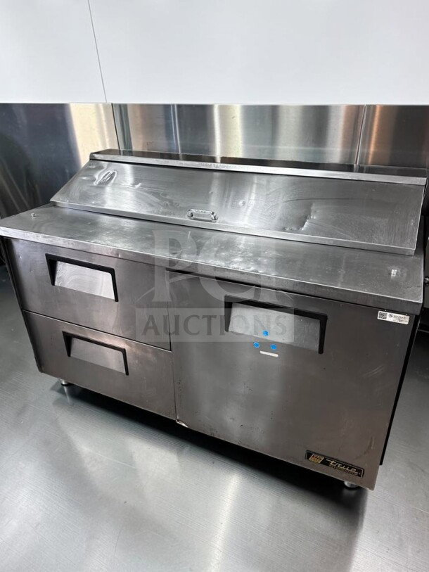 True TSSU-60-16D-2 refrigerated prep table, 60", right door, two drawers, excellent condition, NSF & UL listed.