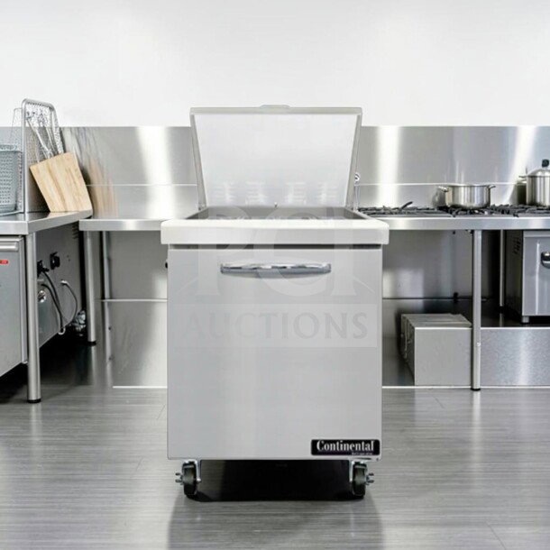 Continental SW27N12M refrigerated prep table, 12 pan capacity, superb condition, stainless steel, on casters, tested operational.