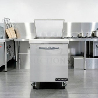 Continental SW27N12M refrigerated prep table, 12 pan capacity, superb condition, stainless steel, on casters, tested operational.