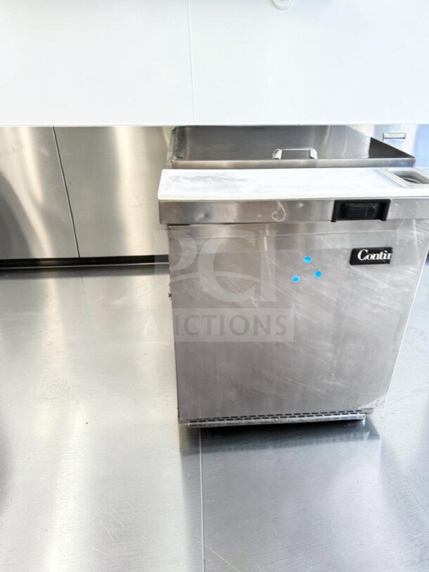 Continental SW27N12M 27" refrigerated prep table in superb condition, 12 pan capacity, stainless steel, 115V, fully tested.