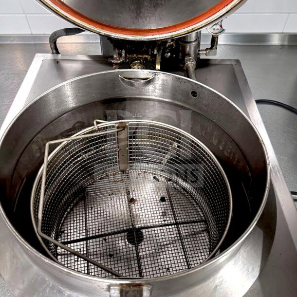 BKI FKG-FC commercial gas pressure fryer, 24" wide, 18 lb capacity, stainless steel, 70,000 BTU, prime condition.