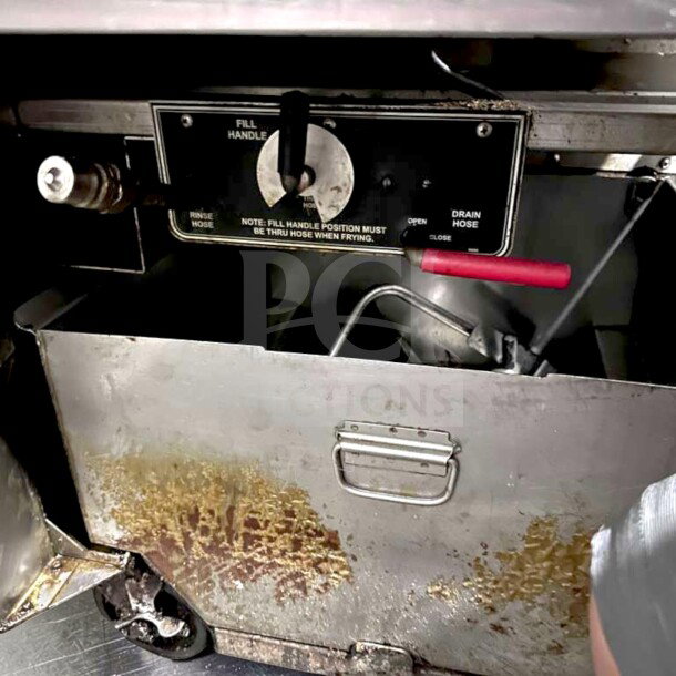 BKI FKG-FC commercial gas pressure fryer, 24" wide, 18 lb capacity, 70,000 BTU, stainless steel, fully tested, operational.