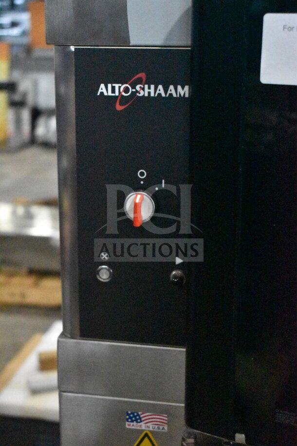 BRAND NEW 2023 Alto Shaam AR-7EVH electric rotisserie oven, 208V, 3 phase. Features control panel, "Made in USA" label.