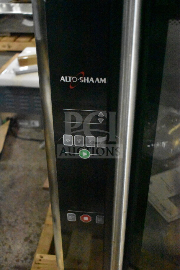 Brand new Alto Shaam AR-7EVH rotisserie oven, electric, 208V, 3-phase, visible control panel, minor scratches.