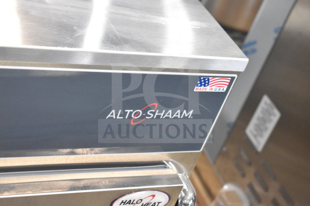 BRAND NEW Alto Shaam 750-S holding cabinet, mobile, 2023 model; holds 10 pans, scratches present, Made in USA label.