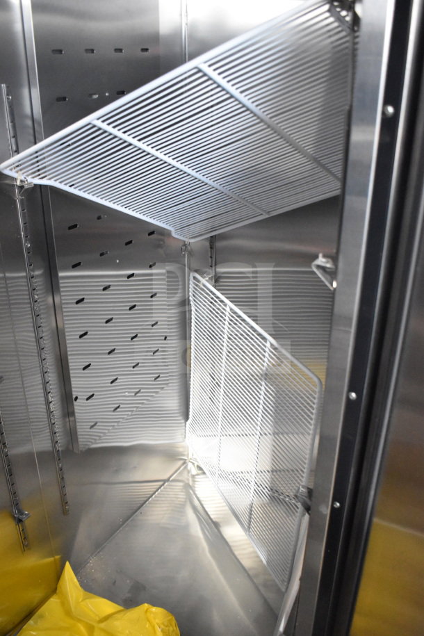 Migali C-3R-HC commercial cooler interior with stainless steel shelves. Brand new, minor scratches. 115V, 1 phase.