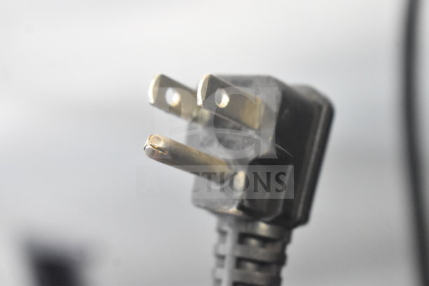 Close-up of the power plug for 2017 Migali C-3R-HC Commercial 3 Door Reach In Cooler, 115 Volts, 1 Phase.