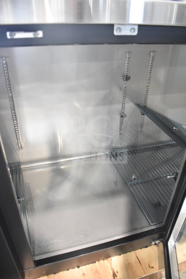 Avantco 178UBB4GHC glass door back bar refrigerator, counter height, new condition, interior shelves, scratch and dent.