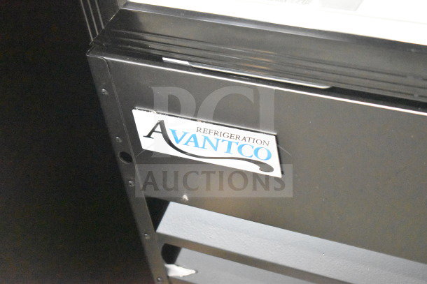 Brand new Avantco 178GDC12FHCB commercial black swing glass door merchandiser freezer. Features LED lighting, commercial casters, 115 volts, 1 phase. Slight scratch and dent. Visible Avantco logo.