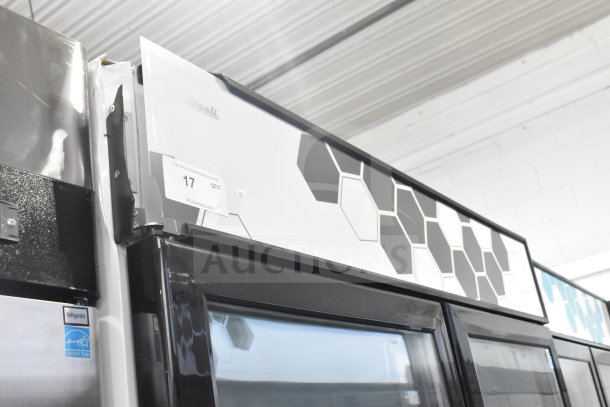 Brand new 2022 Migali C-49FM-HCe 3-door commercial freezer merchandiser on casters, minor cosmetic scratches.