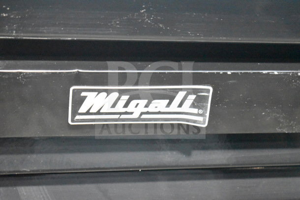 Migali logo on a black panel, part of the 2022 C-49RM-HC Commercial 3 Door Reach-In Cooler Merchandiser.