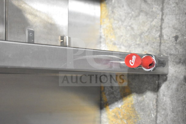Curtis G4TP2T10A3500 coffee brewer handle with visible scratch. Red Curtis logo on handle.