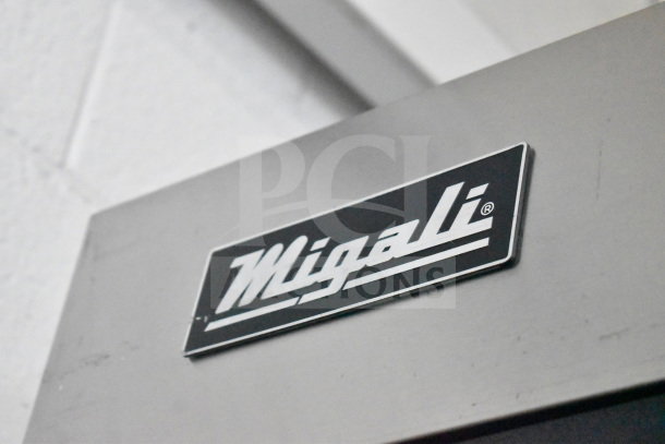 Migali logo on silver background. Part of Migali C-3R-HC Commercial 3 Door Reach In Cooler.