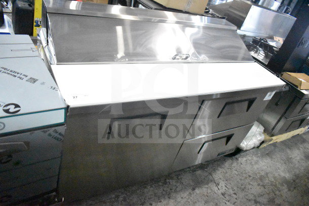 Brand new True TSSU-60-16D-2-HC sandwich salad prep table, two drawers, 115V, stainless steel, minor scratches, commercial use.