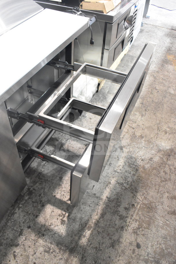 Brand new 2026 True TSSU-60-16D-2-HC commercial sandwich prep table with two drawers, scratch and dent condition.