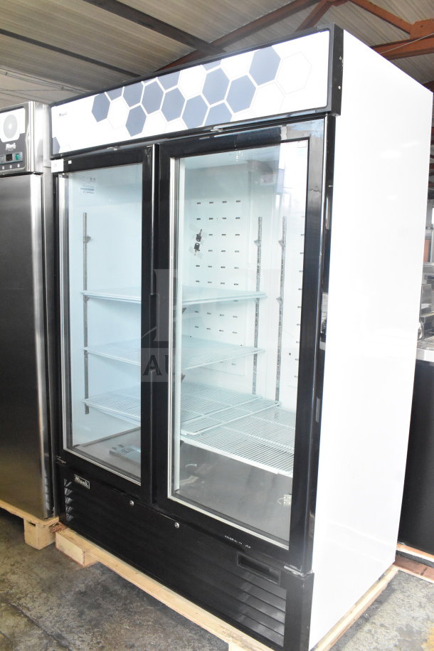 Brand new 2019 Migali C-49FM-HCe commercial 2-door reach-in freezer on casters, 115V, minor scratches.