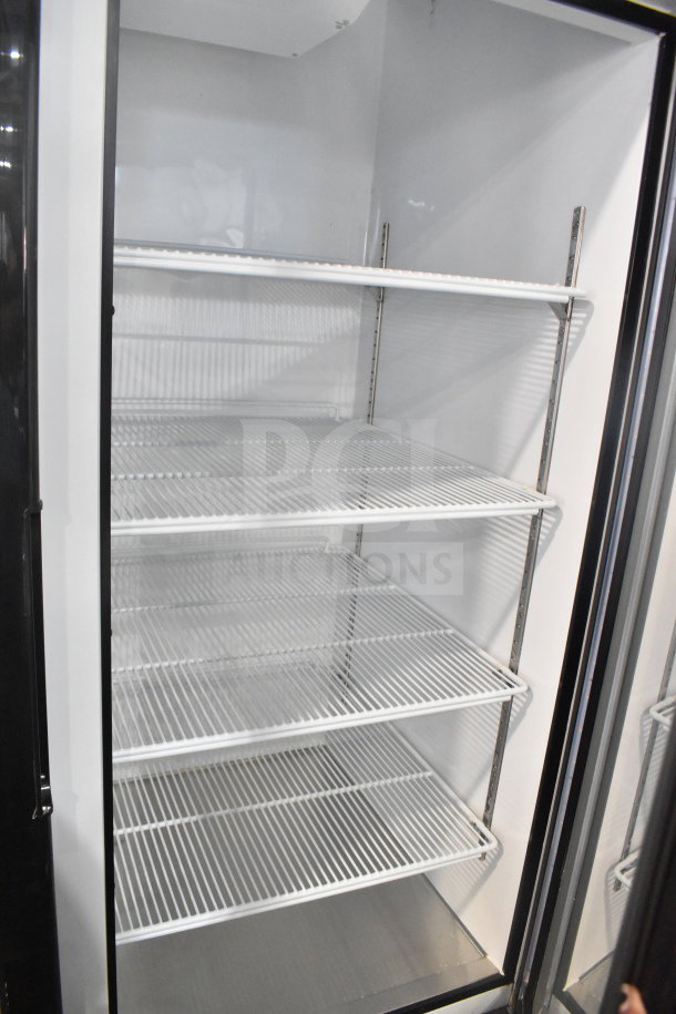 Brand new Migali C-49RM 2-door reach-in freezer merchandiser, commercial casters, 115V, 1 phase, scratch and dent condition.