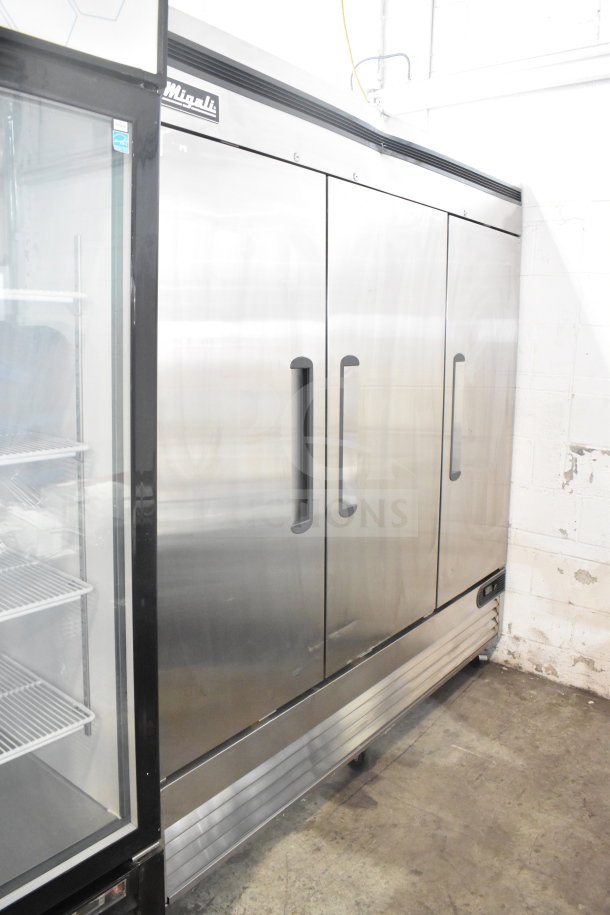 Brand new 2023 Migali C-3FB-HC 3-door commercial freezer, scratch and dent, on casters, 115V, 1 phase.