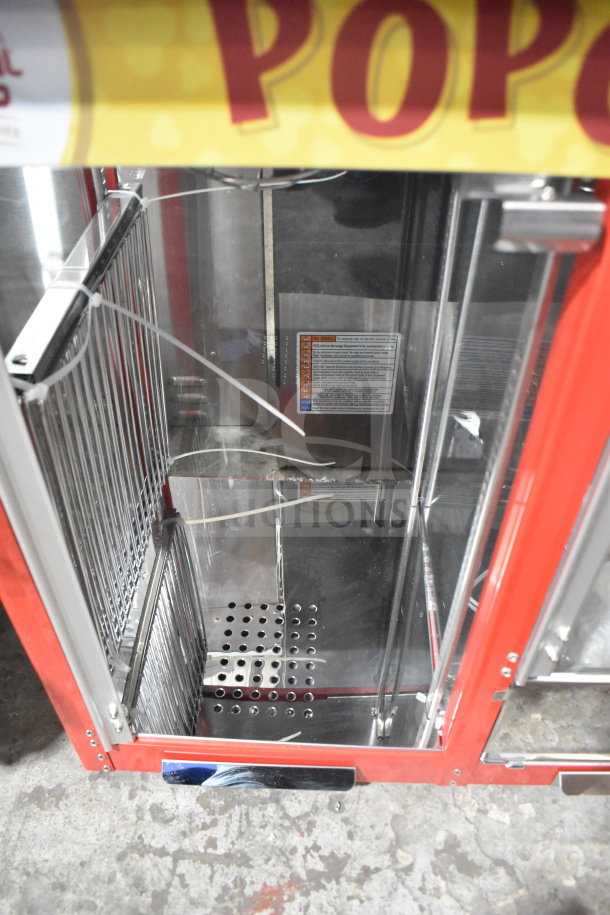 Brand new Carnival King 382PMW17R popcorn machine, scratch and dent condition, missing glass pane, 110V, 1 phase.