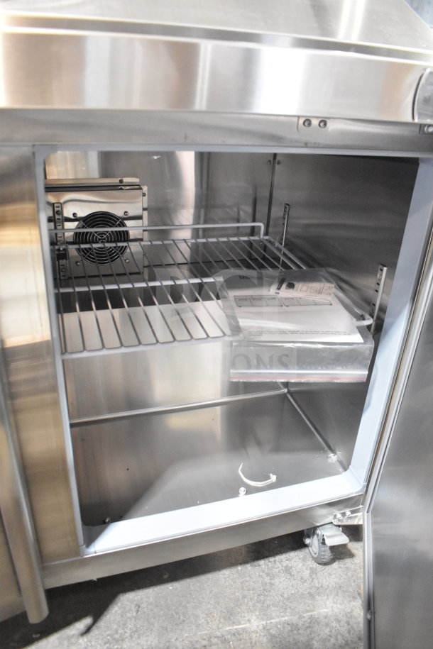 Brand new Eqchen KSR-48BM sandwich salad prep table, stainless steel, on casters, 115V, 1 phase, interior view shown.
