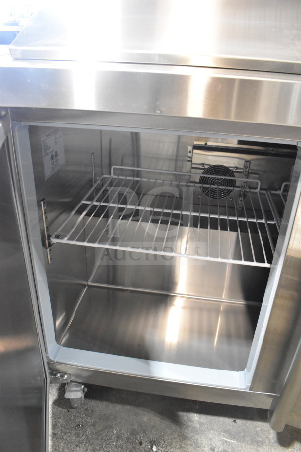 Brand new Eqchen KSR-48BM commercial prep table. Scratch and dent, stainless steel, on casters, 115V, 1 phase.
