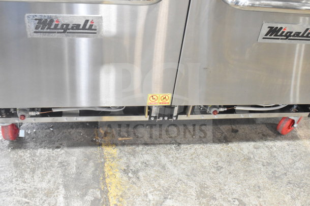 Migali C-RO8B-NG 8-burner range with 2 ovens, commercial casters, new scratch and dent, serial C-RO8B-NGP19004.