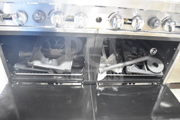 Migali C-RO8B-NG 8 burner range with 2 ovens, new condition, commercial casters, features visible parts and controls.