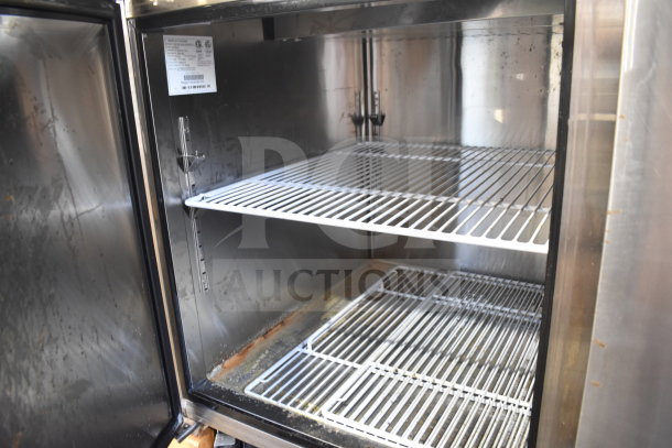 Brand new Migali C-PP93-HC pizza prep table, scratch and dent condition, features adjustable wire shelves. Serial C-PP93-HCP51T010.