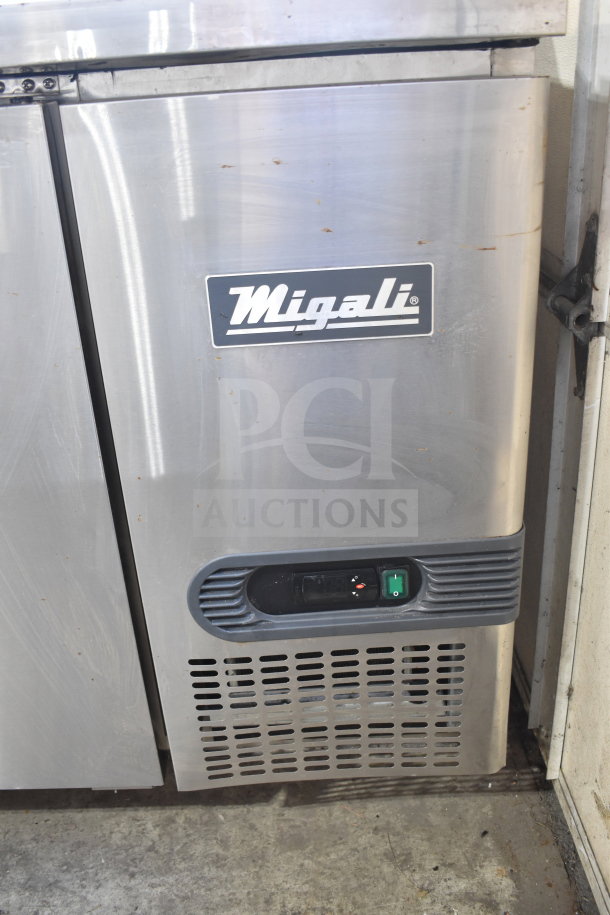 Brand new 2025 Migali C-PP93-HC Pizza Prep Table, stainless steel, scratch and dent, visible Migali logo.